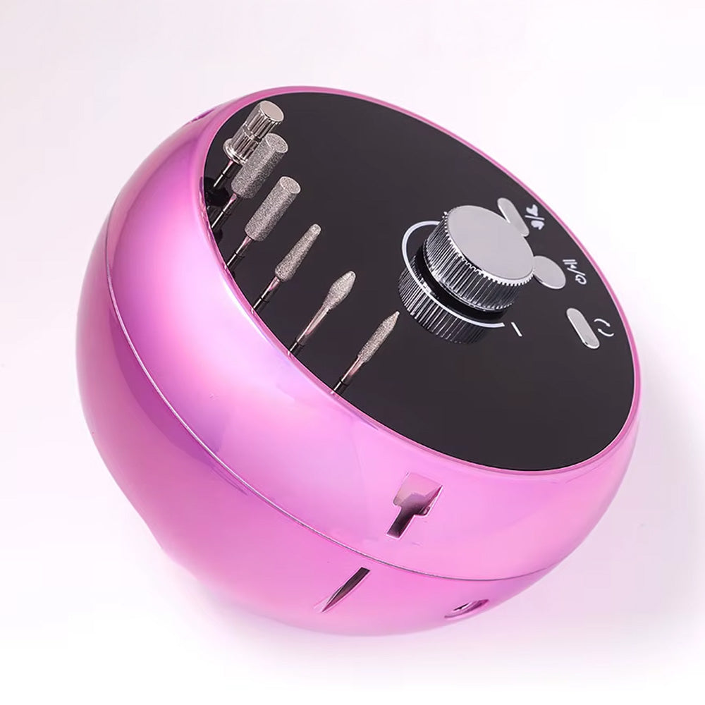 Vue latérale de la Ponceuse ongle professionnelle 45000 RPM précise et efficace avec embouts de rechange intégrés.